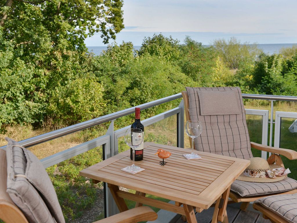 Balkon mit Meerblick; Ferienwohnung liegt direkt hinter der Düne