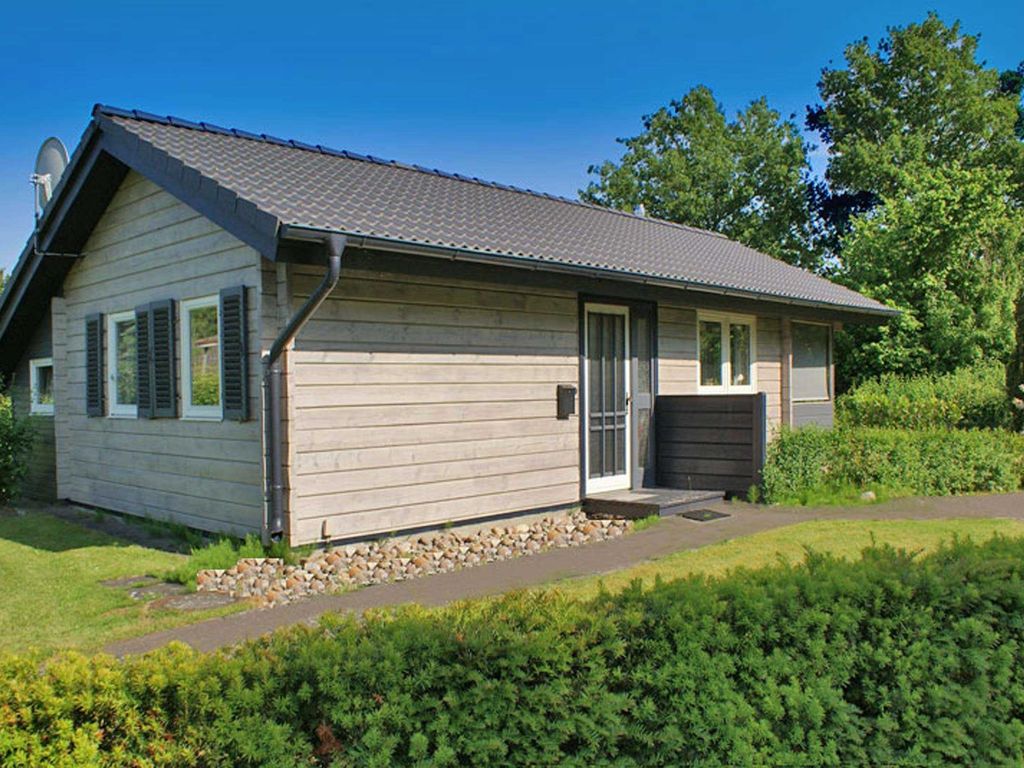 Blockhaus mit Parkplatz vor der Haustür