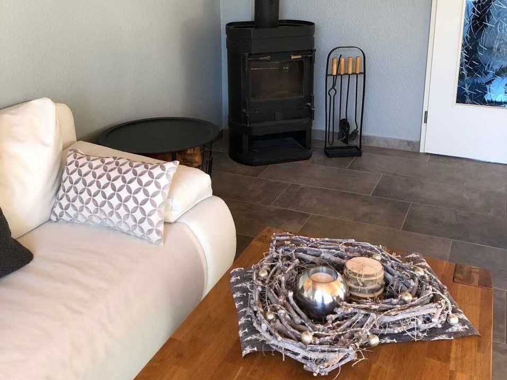 Wohnzimmer mit Kamin