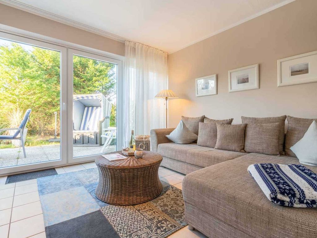 Wohnzimmer und Terrasse - St Peter Ording Dorf, Ferienhaus Groener Weg 9, Wohnung 1 Duenensonne EG