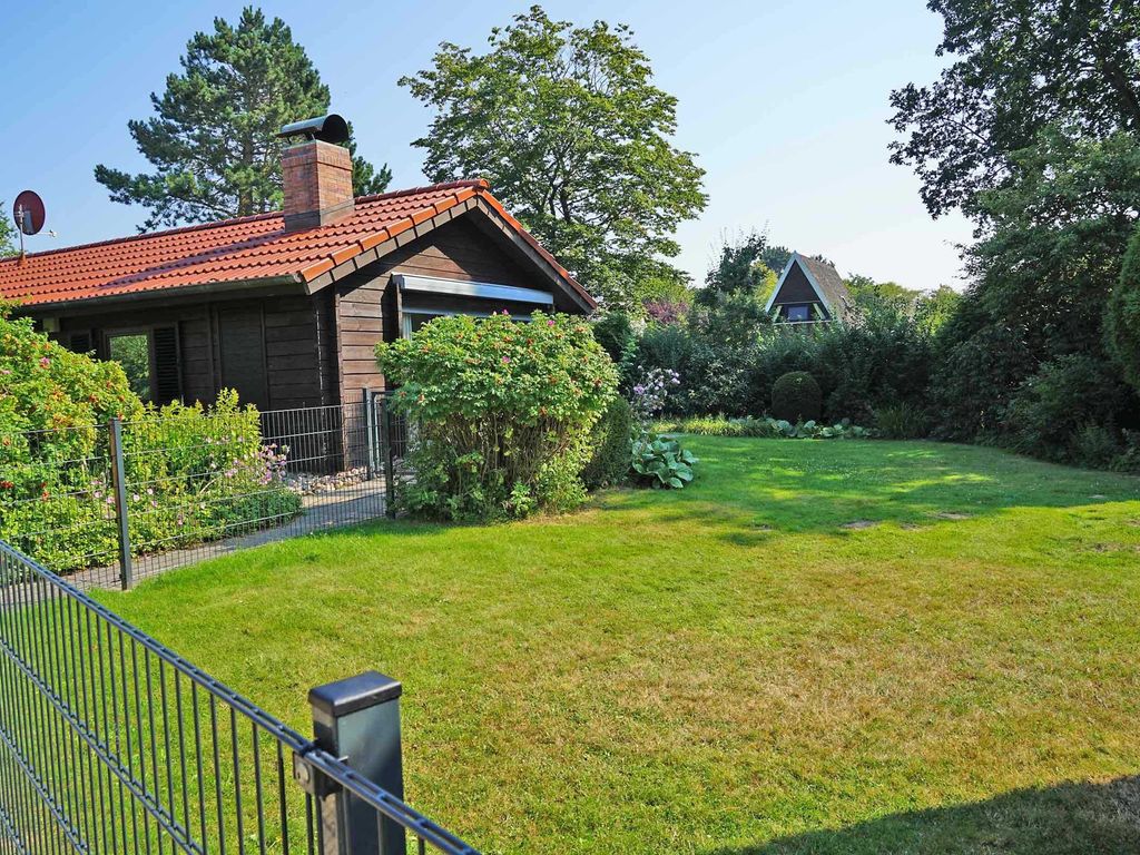 Blockhaus mit Zaun, W-LAN und grosser Terrasse