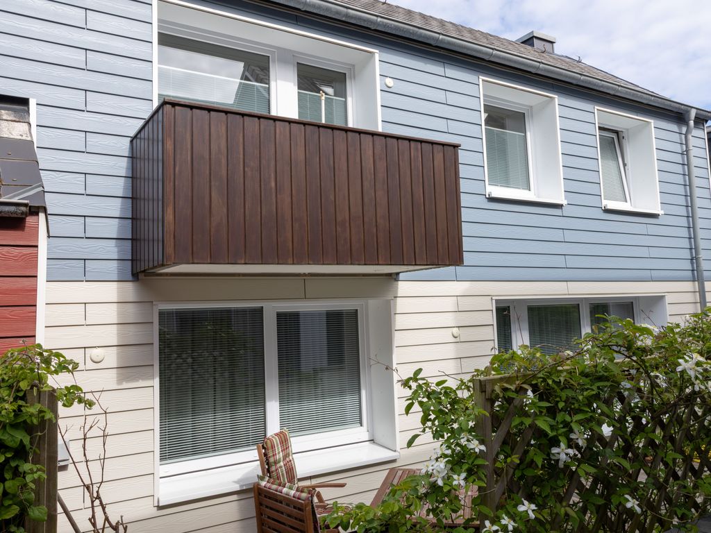 Wohnung EG und OG mit Terrasse und Balkon