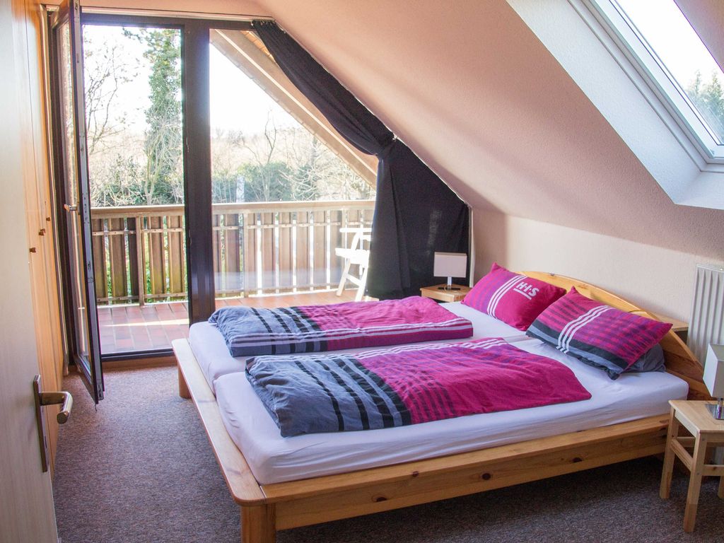 Schlafzimmer mit Balkon