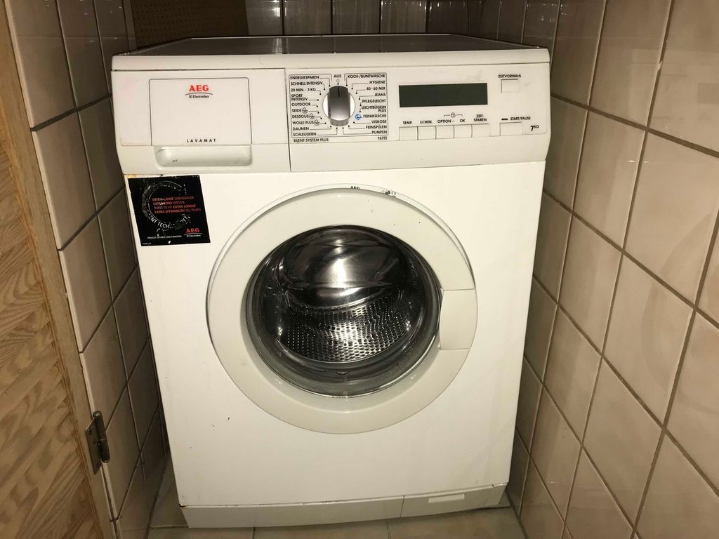 Waschmaschine im separaten Raum