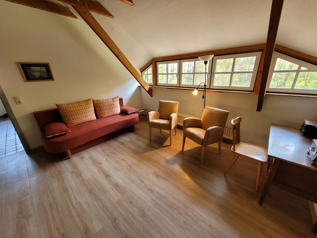 Wohnzimmer Südseite mit Schlafcouch