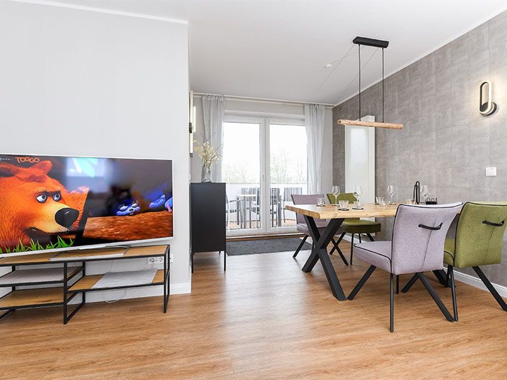 Wohnzimmer mit integriertem Küchenbereich