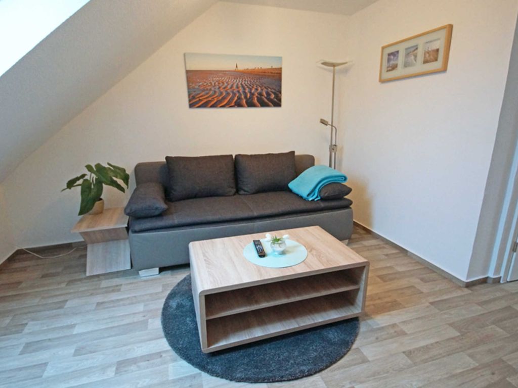 Wohnzimmer mit Schlafsofa